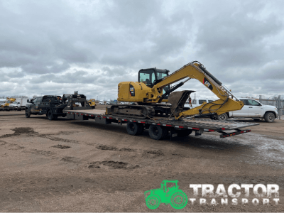 2013 Cat 308E CR Tracked excavator hauling