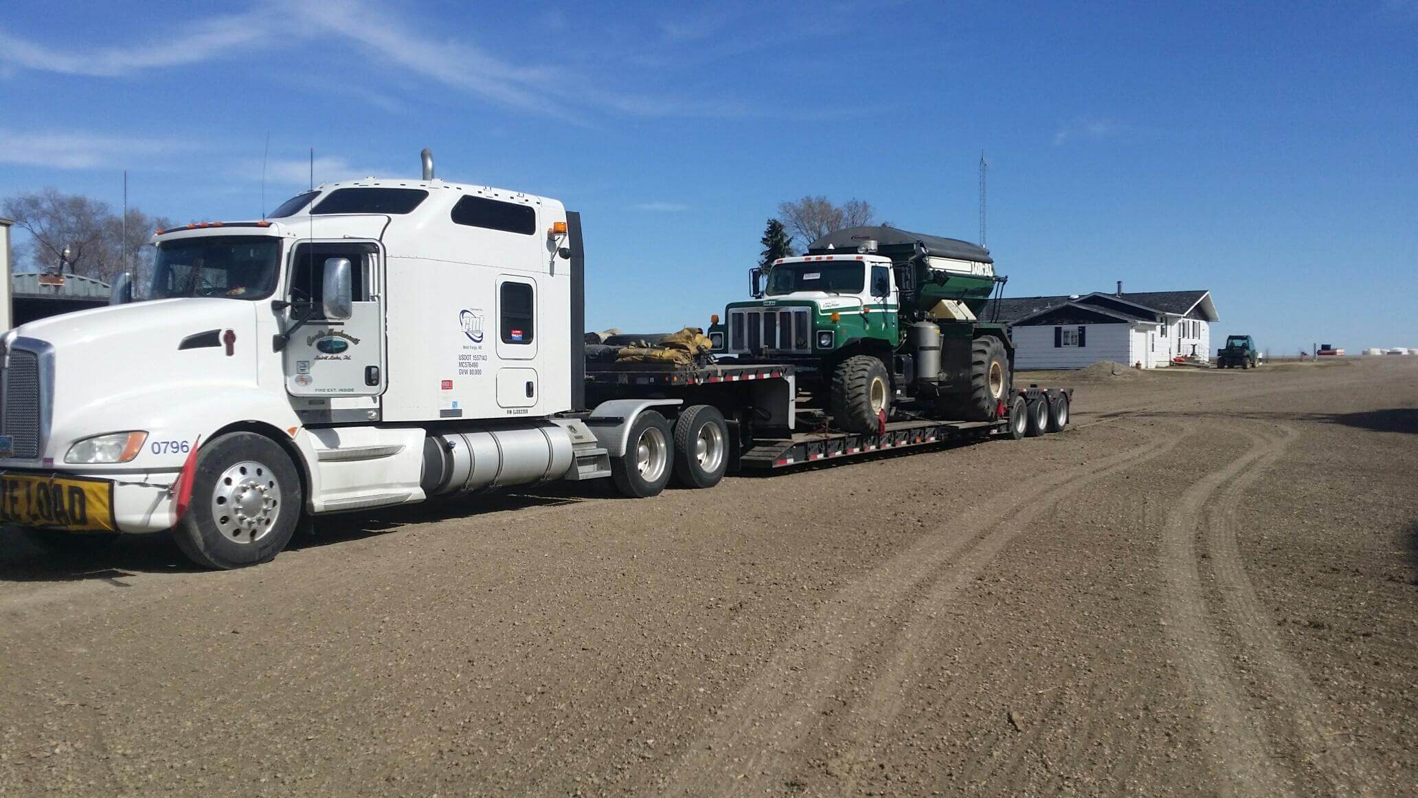 Transporting Loral 310 Floater Truck