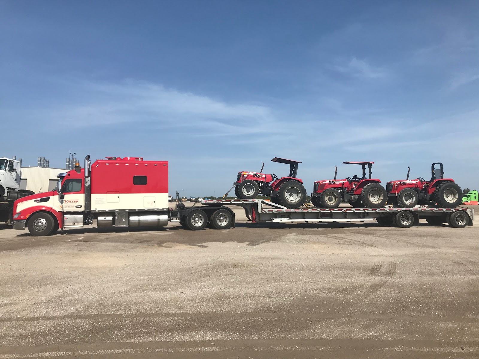 3 massey ferguson 2660 tractors being transported